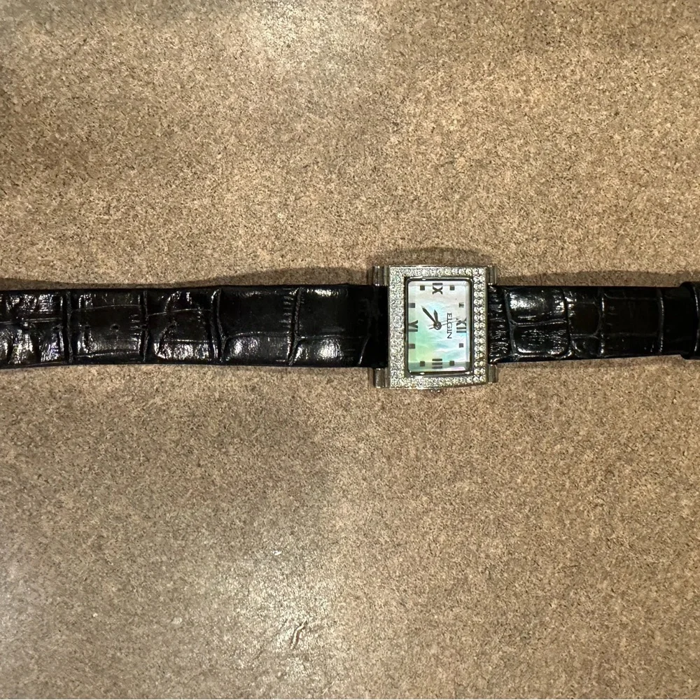 Elgin watch with mother of pearl face